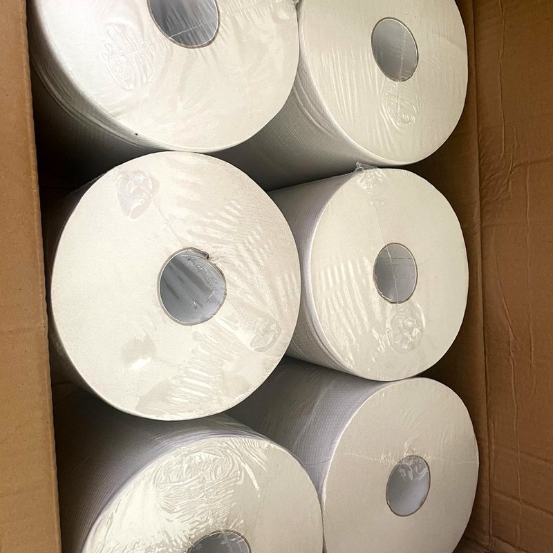 Case of white hardwound paper towel rolls